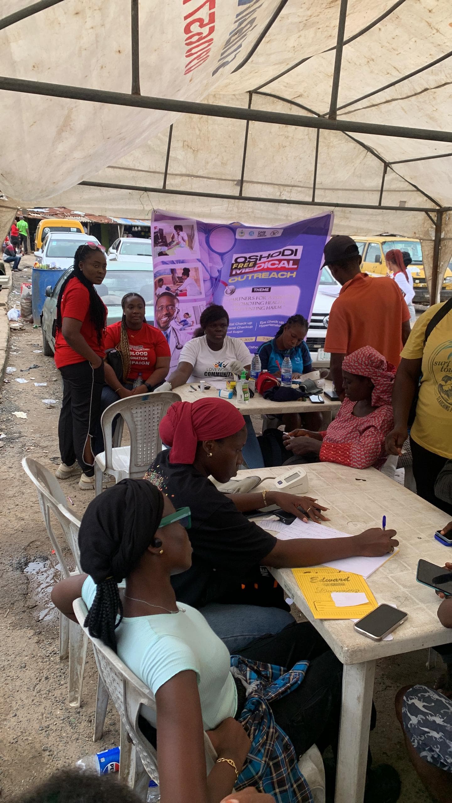 A group attending a public awareness meeting.