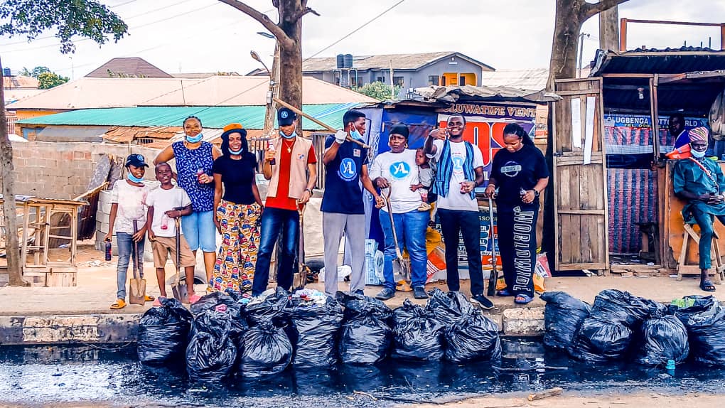 Children reaching out to camera